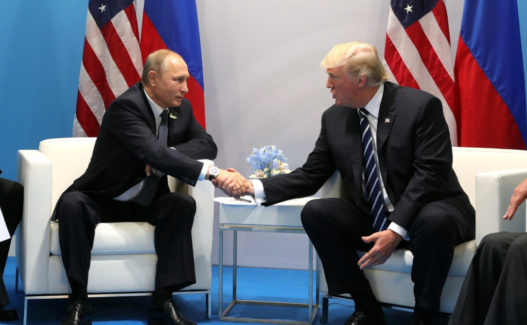 Donald-Trump-and-Vladimir-Putin-shake-hands