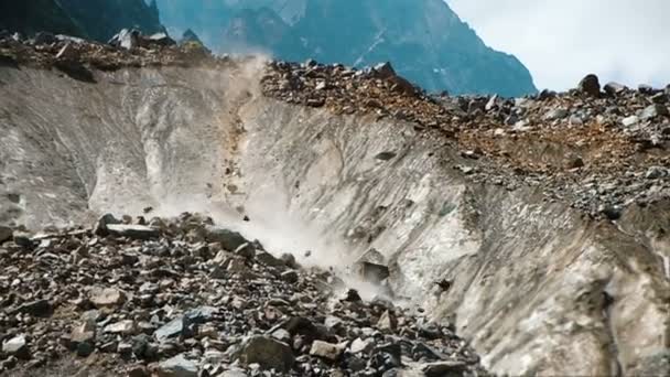 depositphotos_209383320-stock-video-slow-motion-rockfall-in-the