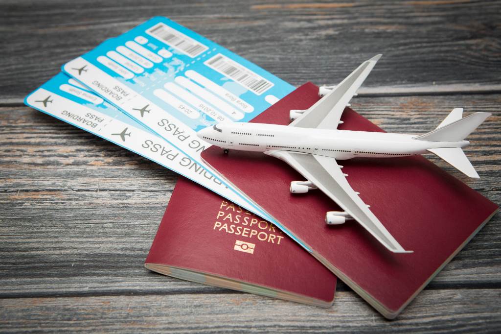 Passports_Boarding_Passes_and_a_Miniature_Airplane_Air_Passenger