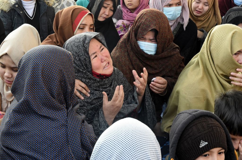 recueillement-colere-4-janvier-2021-quetta-pakistan-autour-cercueils-mineurs-communaute-hazara-victimes-attaque-revendiquee-organisation-etat-islamique_1_1399_931 recueillement-colere-4-janvier-2021-quetta-pakistan-autour-cercueils-mineurs-communaute-hazara-victimes-attaque-revendiquee-organisation-etat-islamique_1_1399_931