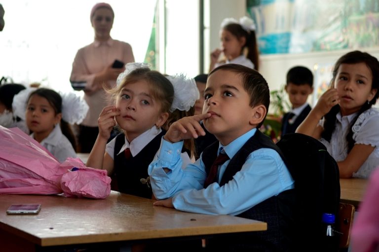 How much does school education actually cost in Tajikistan?